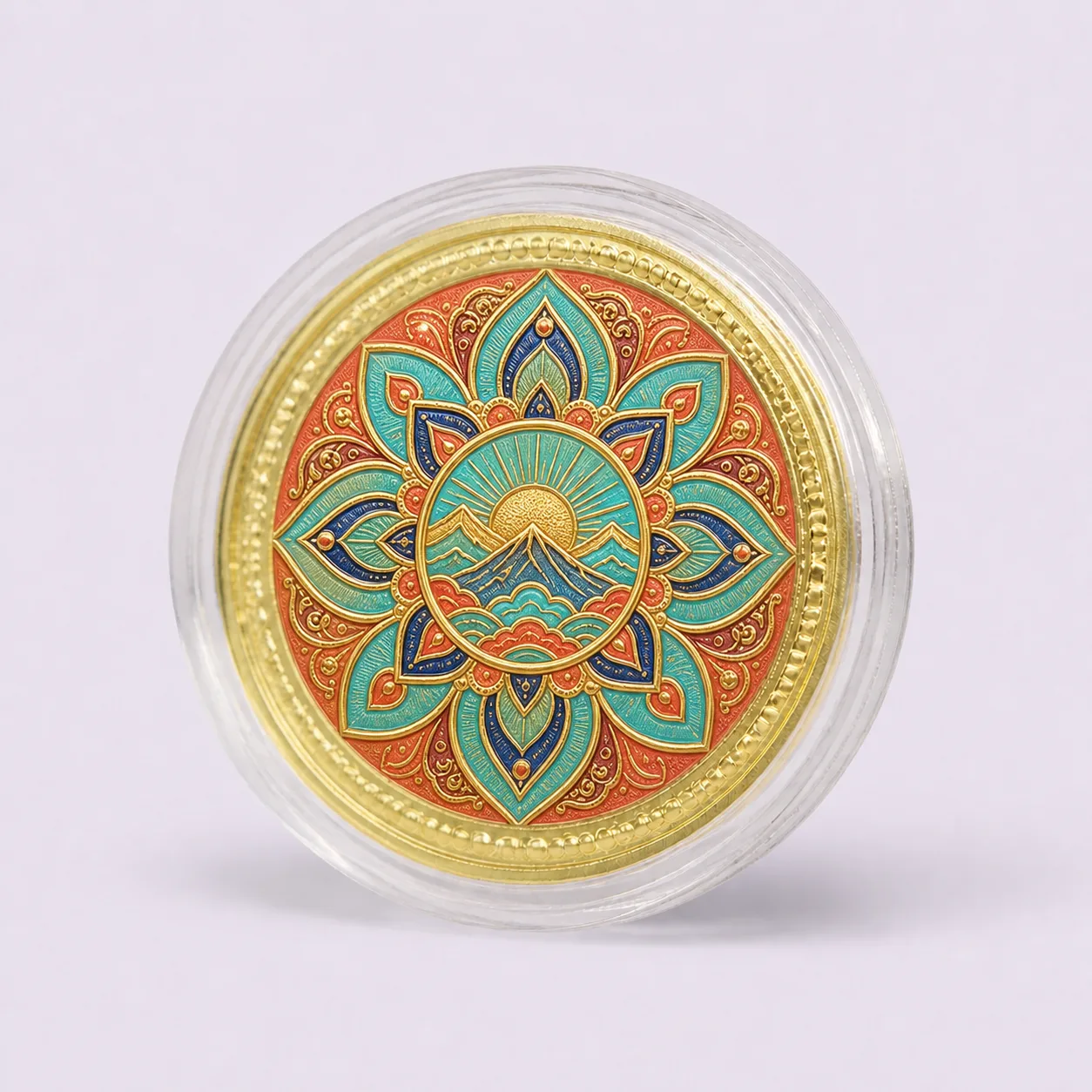 Gold souvenir medallion with a raised colorful cultural pattern in a clear round capsule